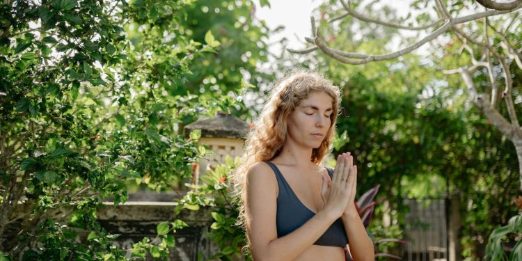 Pretty Woman Wearing Sports Bra in the Garden