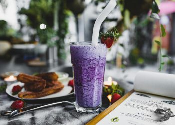 Purple Smoothie on a Clear Drinking Glass