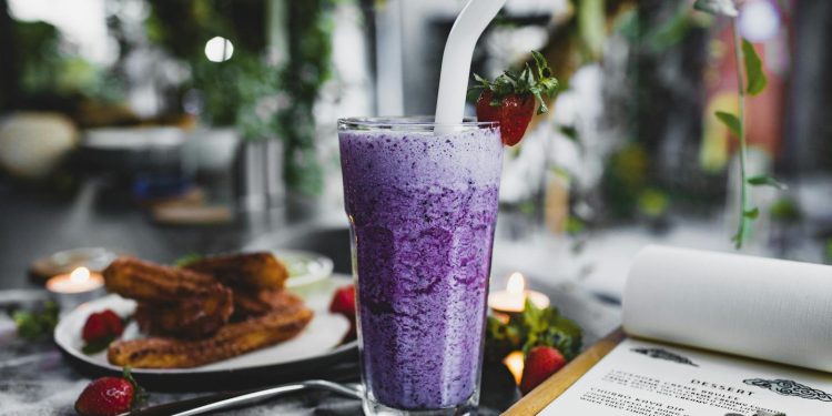 Purple Smoothie on a Clear Drinking Glass