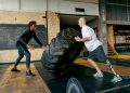 Man with a Prosthetic Leg Exercising at the Gym
