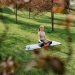 A Woman Meditating at a Park