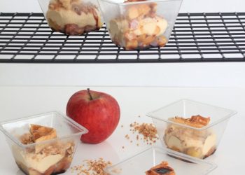 An Apple Near Parfait in Plastic Containers