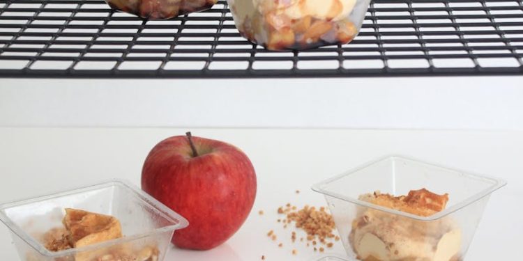 An Apple Near Parfait in Plastic Containers